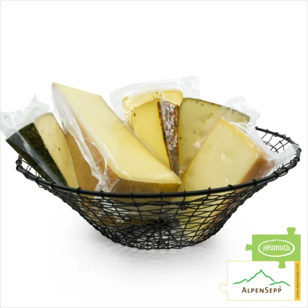 KÄSE GESCHENKBOX &apos;Edelweiss&apos; | 2,5 kg pure Gaumenschmeichelei mit Heumilch® Alpenkäse zum Schenken. Feedbild.